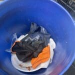 Remove used gloves directly into a trash can only. Don't put them anywhere else. Don't bring them back with you.